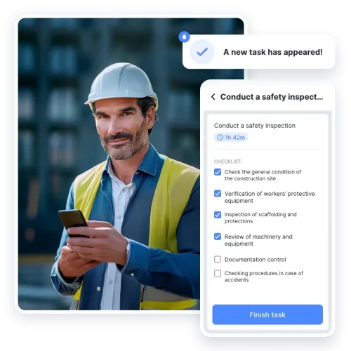 Construction supervisor using mobile app for safety inspection checklist with task alerts.